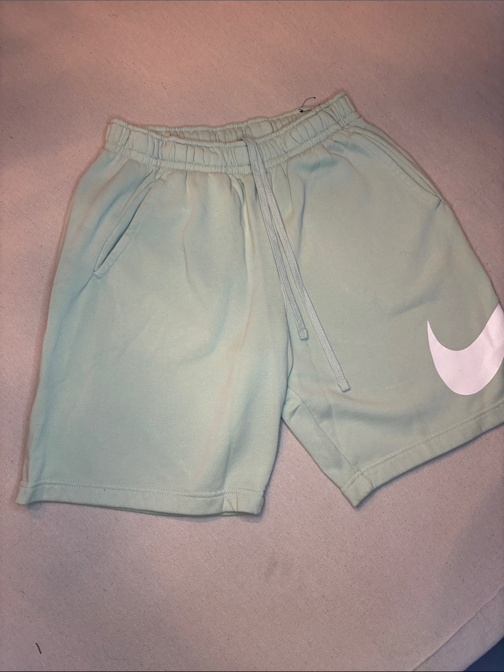Nike Mint Green Athletic Shorts with White Swoosh